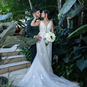 Elegant White Wedding Dress with Floral Details